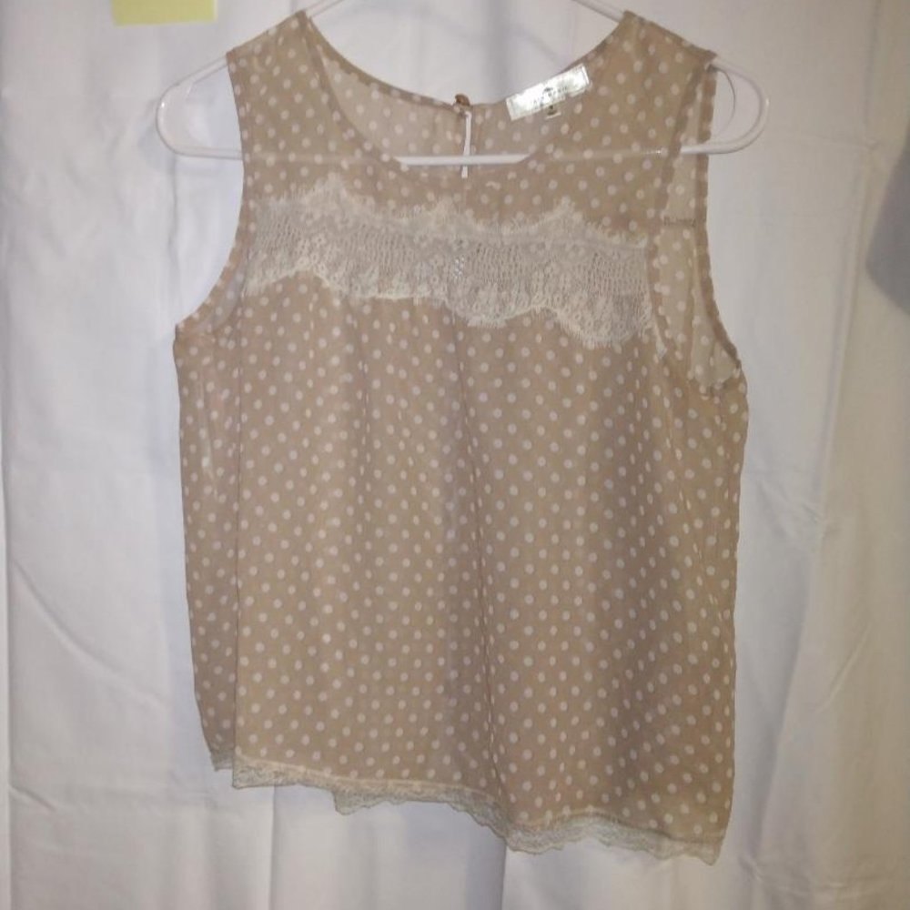 Super cute "Iris Basic" sheer top size small NWOT!!!!
